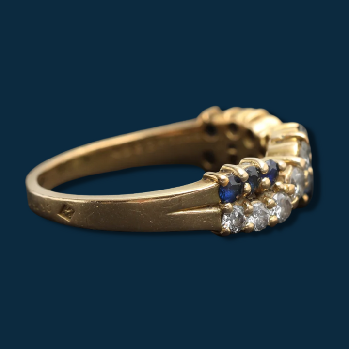 Bague vintage Boucheron or jaune, diamants et saphirs "Serre-moi fort"