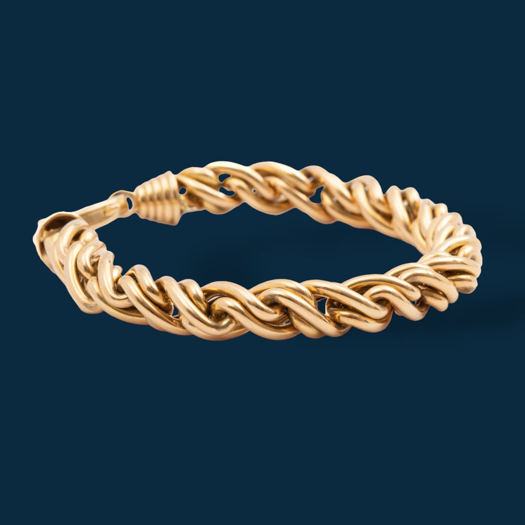 Bracelet OJ PERRIN en fils d'or jaune 18 carats entrelacés