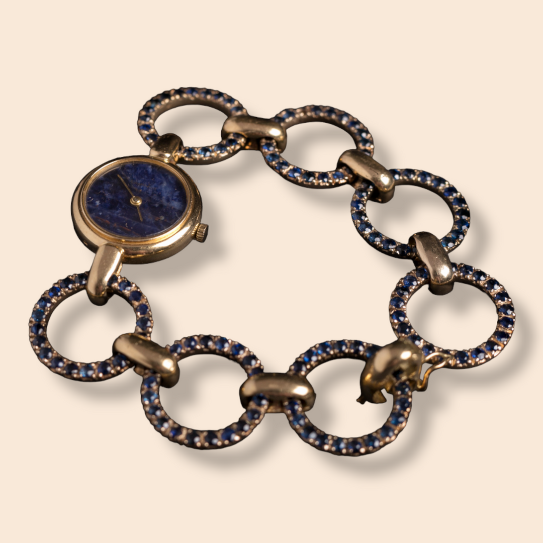 Montre bracelet ancien signée Alexis Barthelay or jaune saphirs "Nuit Etoilée"